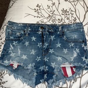 High rise jean shorts, American flag themed with showing pockets